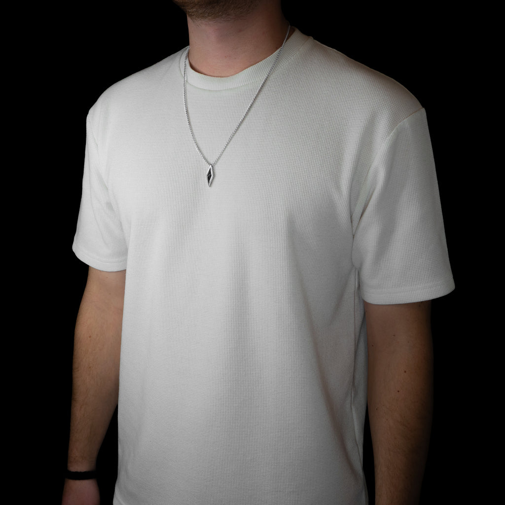 NEXRA SCHWARZER MARMOR - SILBERFARBEN